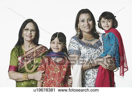Stock Image - Portrait of a senior woman with her daughter and her granddaughters. Fotosearch
