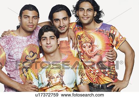 Portrait of a young man with his friends standing behind him View Large Photo Image Stock Photo - Portrait of a young man with his friends standing behind him. Fotosearch