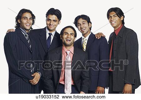 Stock Image - Portrait of five businessmen smiling. Fotosearch