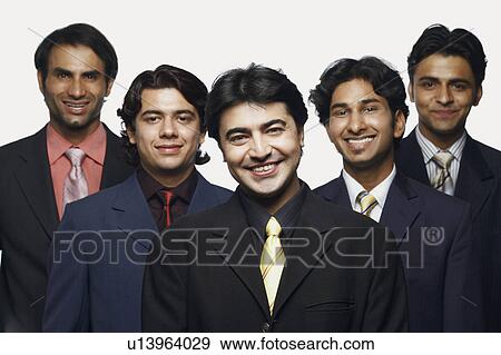 Portrait of five businessmen smiling View Large Photo Image Stock Photo - Portrait of five businessmen smiling. Fotosearch