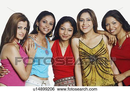 Stock Photograph - Portrait of five young women standing together and smiling. Fotosearch