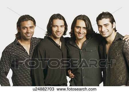 Portrait of four young men smiling View Large Photo Image Stock Image - Portrait of four young men smiling. Fotosearch