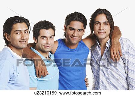 Stock Photo - Portrait of four young men smiling. Fotosearch
