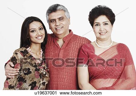 Portrait of parents and their daughter smiling View Large Photo Image Stock Image - Portrait of parents and their daughter smiling. Fotosearch