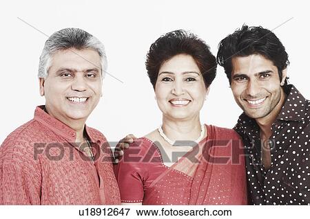 Stock Photo - Portrait of parents and their son smiling. Fotosearch