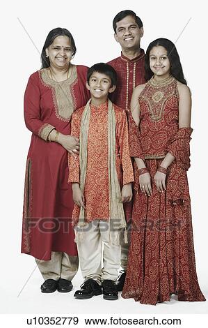 Portrait of parents standing with their son and daughter View Large Photo Image Stock Photo - Portrait of parents standing with their son and daughter. Fotosearch