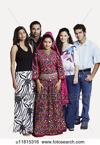 Stock Photograph - Portrait of three young women and two young men standing. Fotosearch