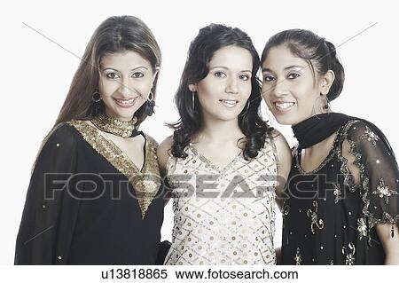 Stock Photography - Portrait of three young women smiling. Fotosearch