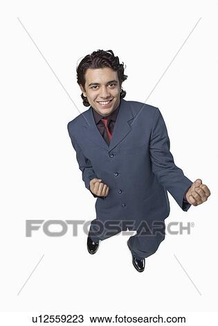High angle view of a businessman clenching his fists View Large Photo Image Stock Image - High angle view of a businessman clenching his fists. Fotosearch