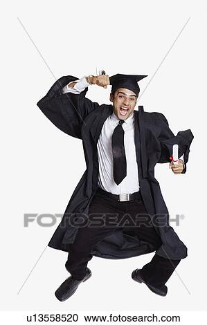 Male graduate jumping and shouting with excitement View Large Photo Image Stock Image - Male graduate jumping and shouting with excitement. Fotosearch