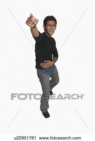 Stock Image - Portrait of a young man dancing. Fotosearch