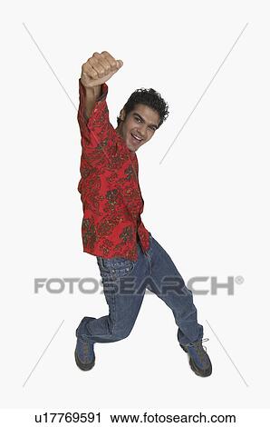Stock Image - Portrait of a young man smiling. Fotosearch