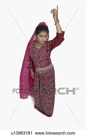 Stock Image - Portrait of a young woman posing. Fotosearch