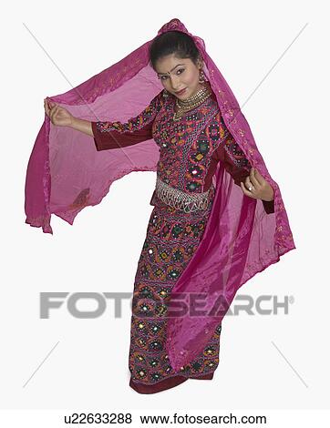 Stock Photo - Portrait of a young woman posing. Fotosearch