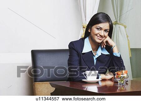 Stock Photo - Portrait of a businessman smiling. Fotosearch