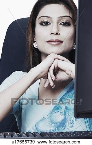 Portrait of a businesswoman smiling View Large Photo Image Stock Photo - Portrait of a businesswoman smiling. Fotosearch