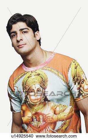 Stock Image - Portrait of a young man posing. Fotosearch