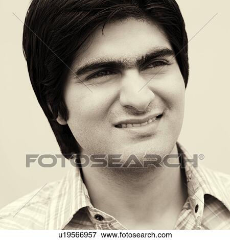 Stock Photo - Close-up of a young man smiling. Fotosearch