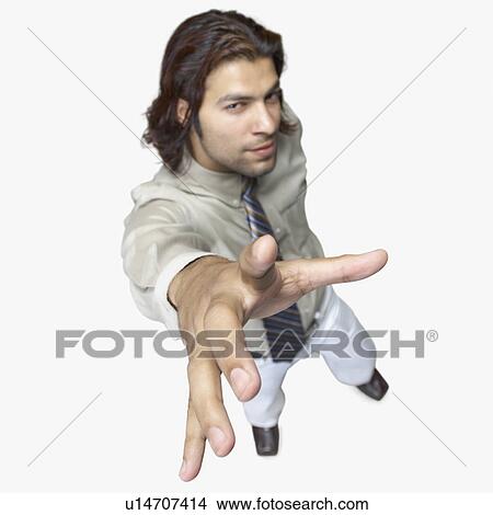 Picture - High angle view of a businessman reaching up. Fotosearch