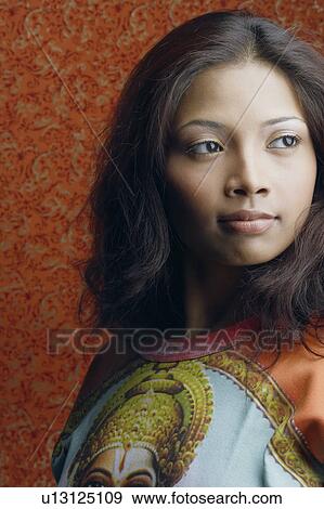 Stock Photo - Close-up of a young woman. Fotosearch