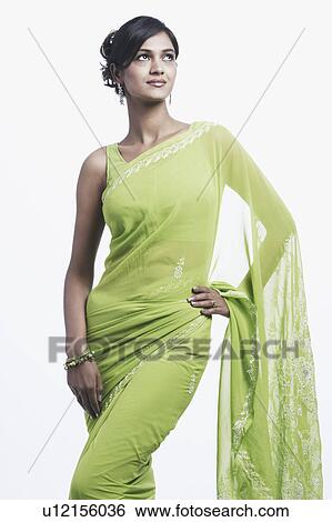 Stock Photograph - Close-up of a young woman posing. Fotosearch