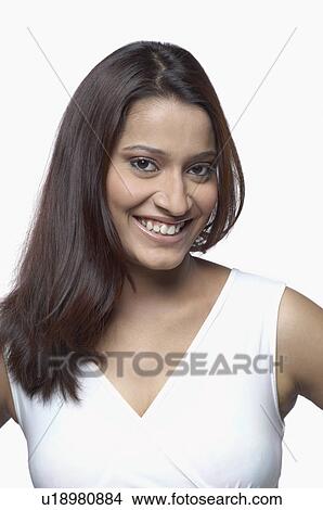 Portrait of a young woman smiling View Large Photo Image Picture - Portrait of a young woman smiling. Fotosearch