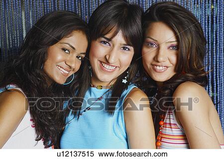 Portrait of three young women smiling View Large Photo Image Stock Photography - Portrait of three young women smiling. Fotosearch