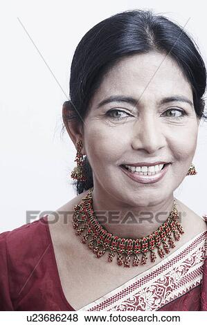 Stock Photo - Close-up of a mature woman smiling. Fotosearch