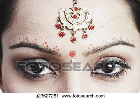 Stock Image - Close-up of a young woman's eyes. Fotosearch