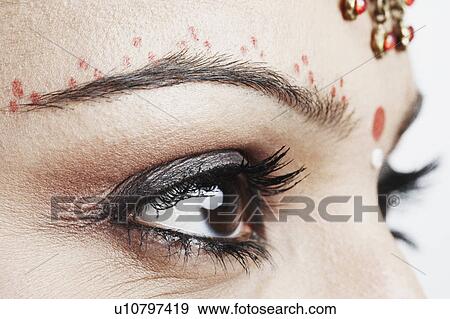 Stock Photo - Close-up of a young woman's eyes. Fotosearch