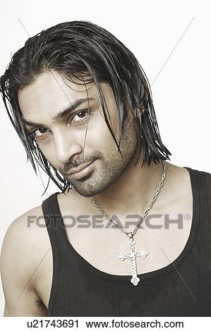 Stock Image - Portrait of a young man. Fotosearch