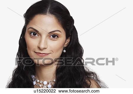 Portrait of a young woman smiling View Large Photo Image Stock Image - Portrait of a young woman smiling. Fotosearch