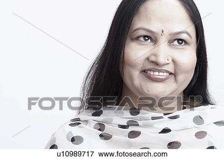 Stock Photo - Close-up of a mature woman smiling. Fotosearch