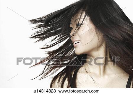 Close Up Of A Young Woman With Tousled Hair Stock Photo