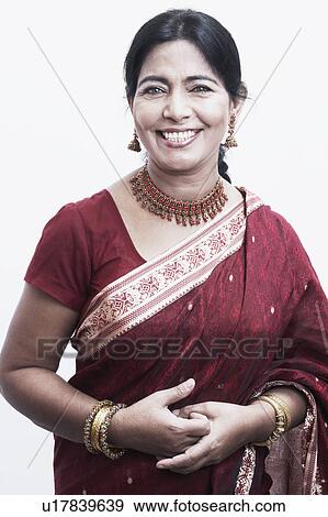 Stock Photo - Portrait of a mature woman smiling. Fotosearch