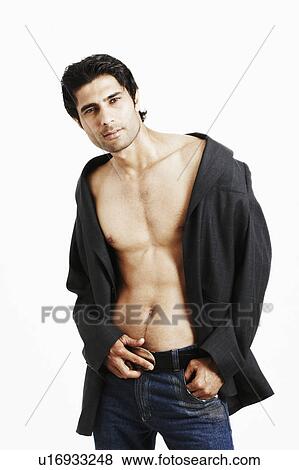 Stock Photo - Portrait of a young man standing. Fotosearch