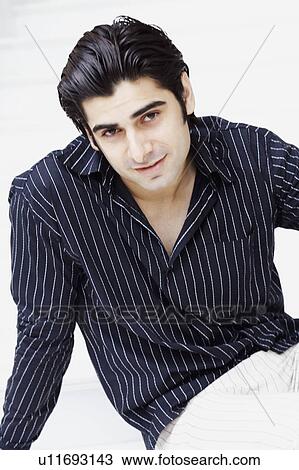 Portrait of a young man View Large Photo Image Stock Image - Portrait of a young man. Fotosearch