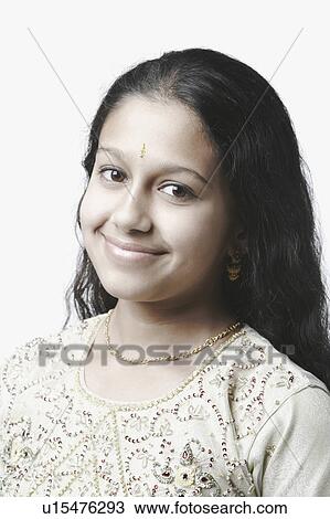 Stock Image - Portrait of a girl smiling. Fotosearch