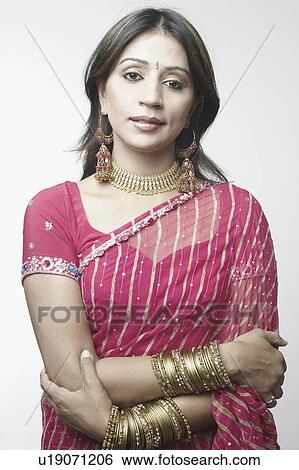 Portrait of a mid adult woman posing View Large Photo Image Stock Photograph - Portrait of a mid adult woman posing. Fotosearch