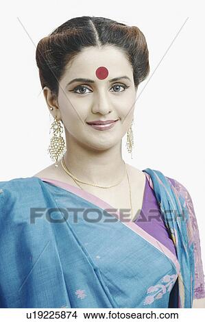 Picture - Portrait of a young woman wearing a sari. Fotosearch