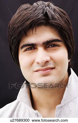 Stock Image - Portrait of a young man. Fotosearch