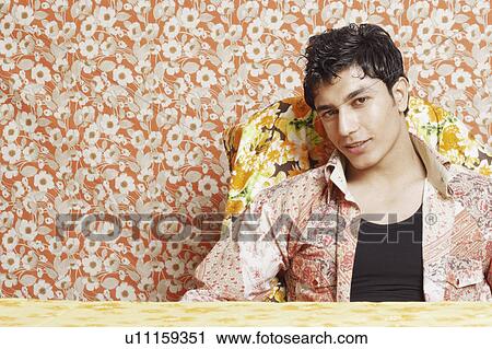 Stock Image - Portrait of a young man smiling. Fotosearch