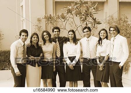 Portrait of a group of business executives smiling View Large Photo Image Stock Image - Portrait of a group of business executives smiling. Fotosearch