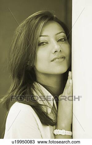 Stock Image - Portrait of a young woman. Fotosearch