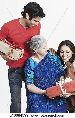 Stock Photo - Close-up of a three generation family. Fotosearch