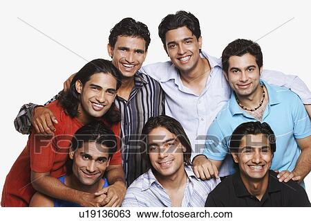 Stock Image - Group of young men smiling. Fotosearch