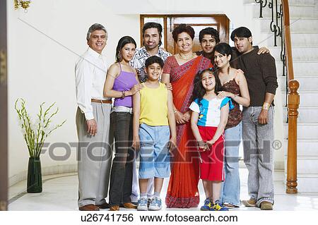 Stock Photograph - Portrait of a family standing together. Fotosearch
