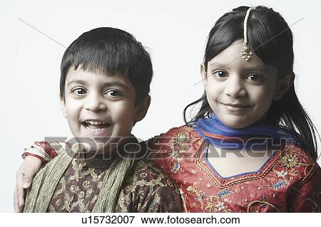 Portrait of a girl and her brother View Large Photo Image Stock Photo - Portrait of a girl and her brother. Fotosearch