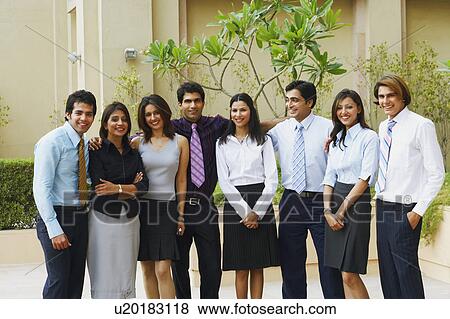 Portrait of a group of business executives smiling View Large Photo Image Stock Photo - Portrait of a group of business executives smiling. Fotosearch