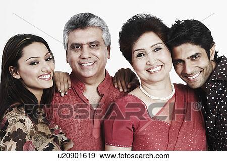 Stock Photo - Portrait of parents and their two children. Fotosearch